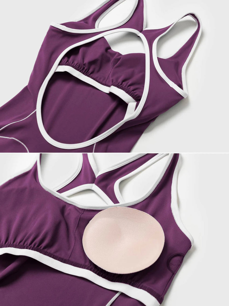VÉNARA™ kontrastfarvet jumpsuit med udsvungne ben – LEVEFIT